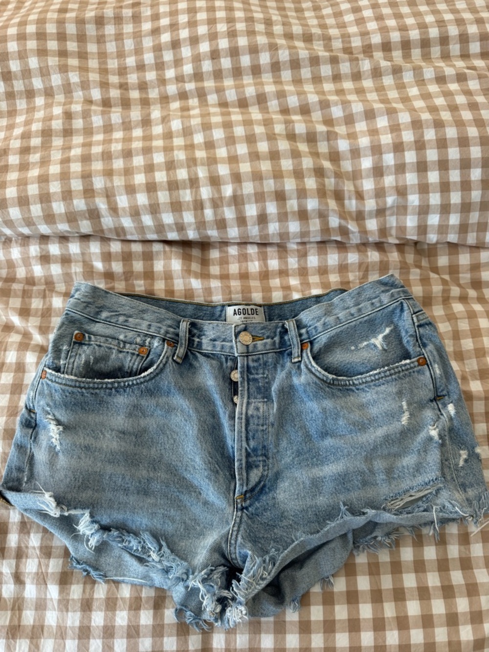 Agolde Faded Light Blue Distressed Denim Shorts